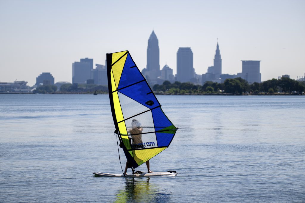 Windsurfer on Lake Erie with the downtown Cleveland skyline in the background