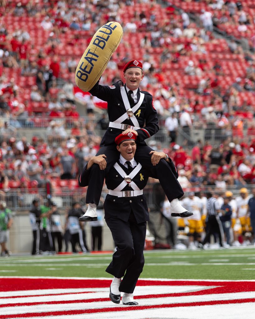 Ohio State Marching Band members holding a “Beat Blue” message at Ohio Stadium